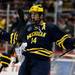 Michigan senior center Kevin Lynch celebrates scoring in the second period of the game against Miami on Saturday, March 23. Daniel Brenner I AnnArbor.com